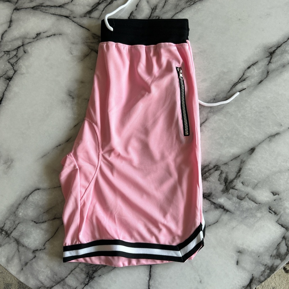 Pink shorts with zipper pockets